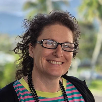 April Hayes smiling outside.